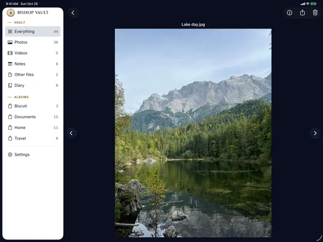 The viewer on iPad held sideways, showing a mountain lake photo beside the sidebar.