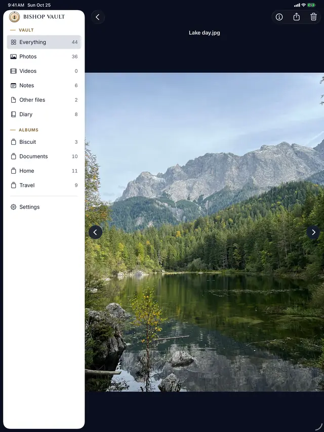 A mountain lake photo open in the viewer on iPad, with the sidebar on the left.